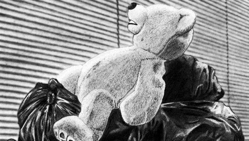 Dio slike vojničke odore i čizama naslonjenih na zid